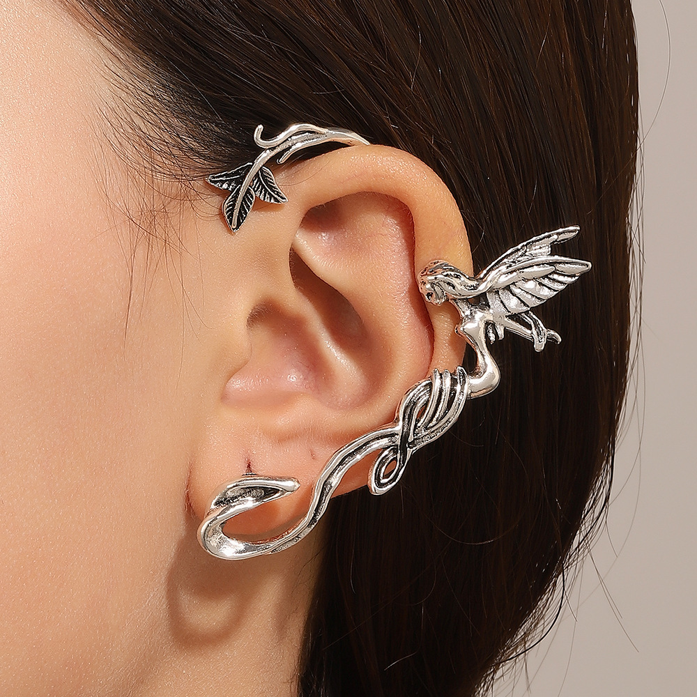 Gothic Three Headed Snake Earr - đánh giá và giá Vintage Fashion Guild